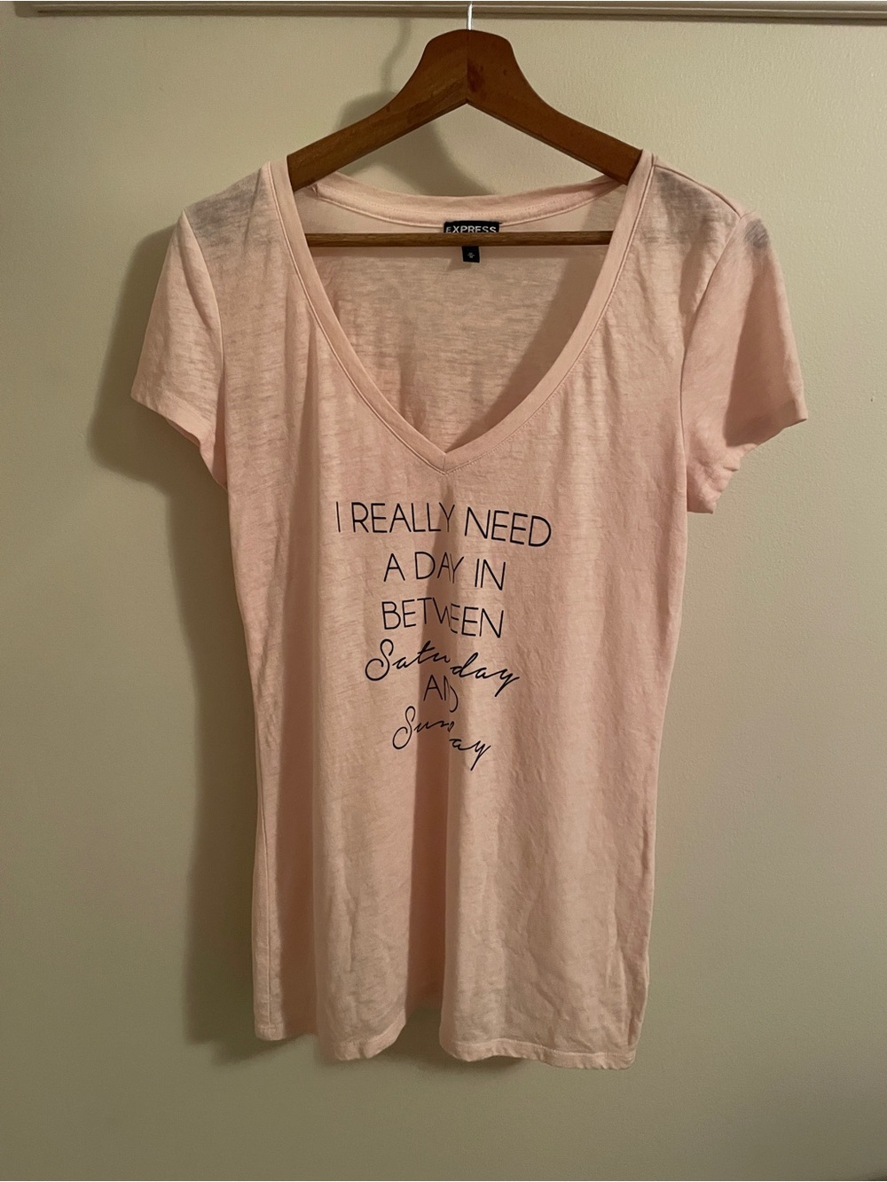 Express Soft Pink V-Neck Graphic Tee.  Slightly sheer. Size M.